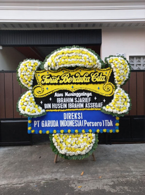 Papan Bunga Duka di Simpar